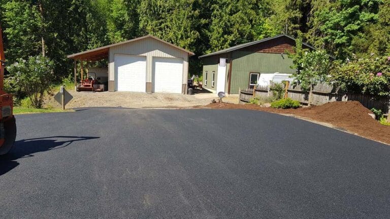 New driveway connecting to a dirt driveway