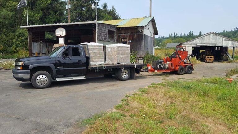 Asphalt trailer attached to a heavy-duty pickup truck